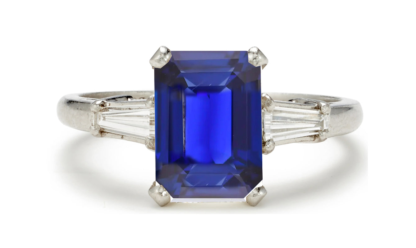 505 custom made unique emerald cut blue sapphire center stone and baguette diamond accents three stone engagement ring