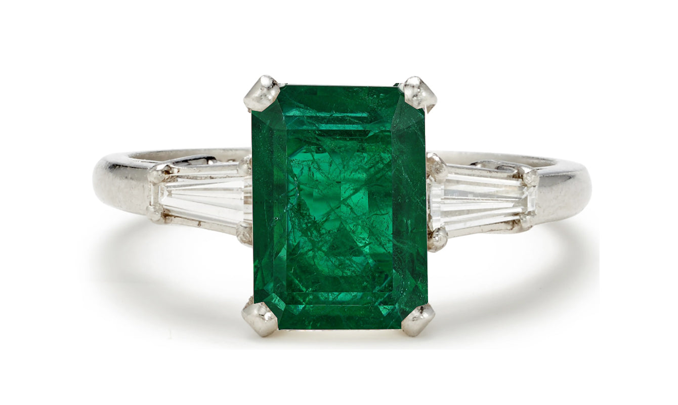 505 custom made unique emerald cut emerald center stone and baguette diamond accents three stone engagement ring