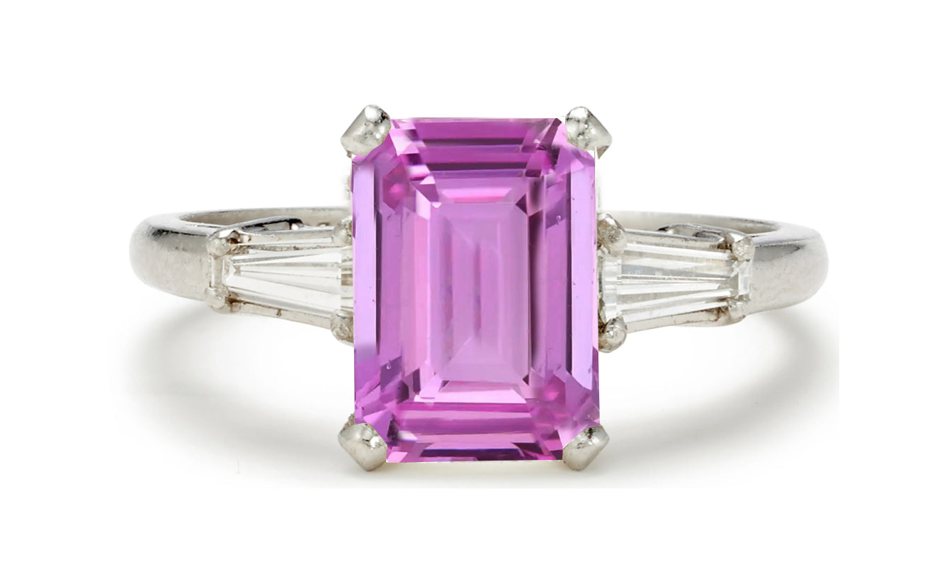 505 custom made unique emerald cut pink sapphire center stone and baguette diamond accents three stone engagement ring