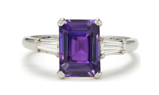 505 custom made unique emerald cut purple sapphire center stone and baguette diamond accents three stone engagement ring