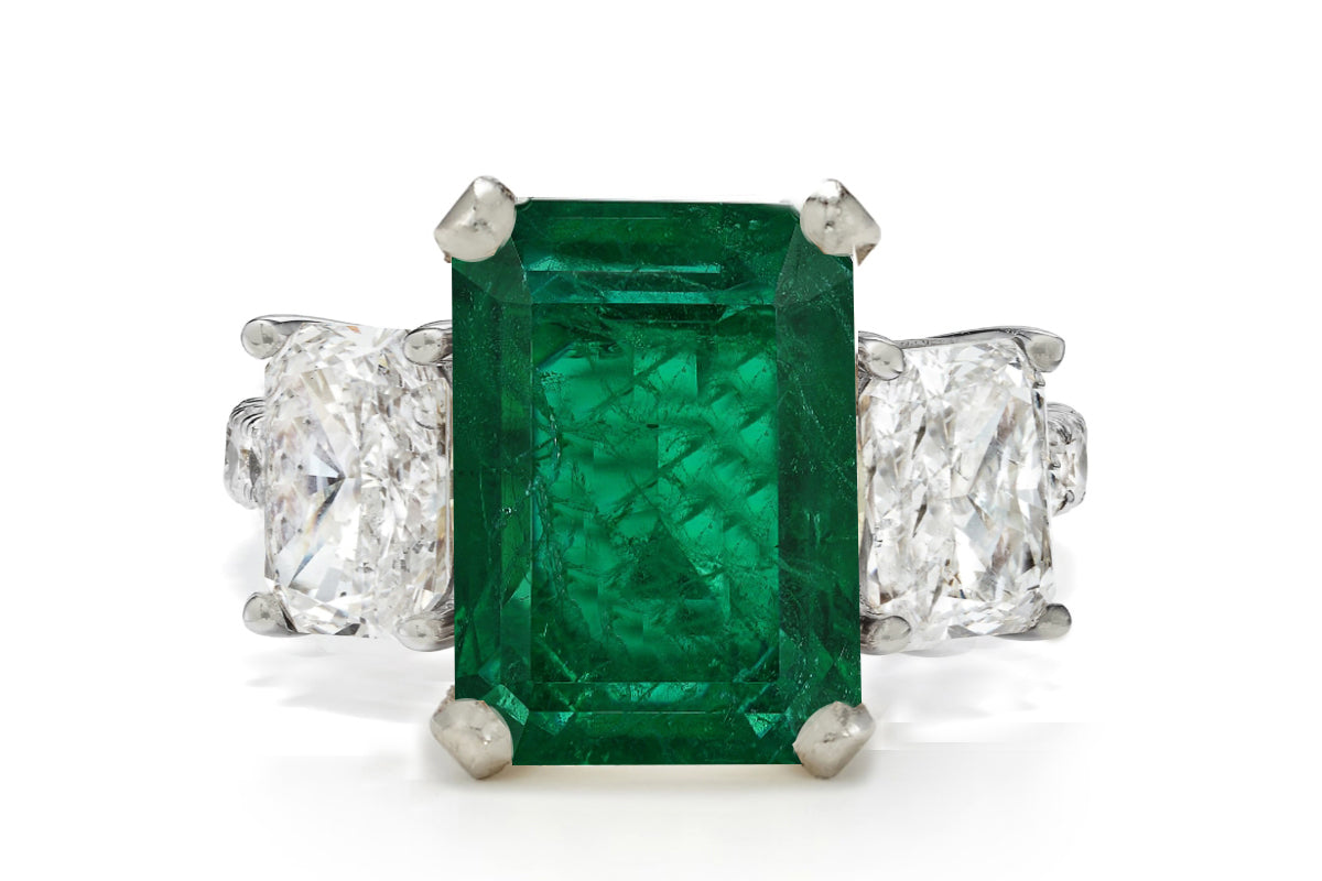 506 custom made unique emerald cut emerald center stone and asscher cut diamond accents three stone engagement ring