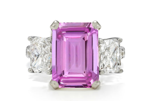 506 custom made unique emerald cut pink sapphire center stone and asscher cut diamond accents three stone engagement ring