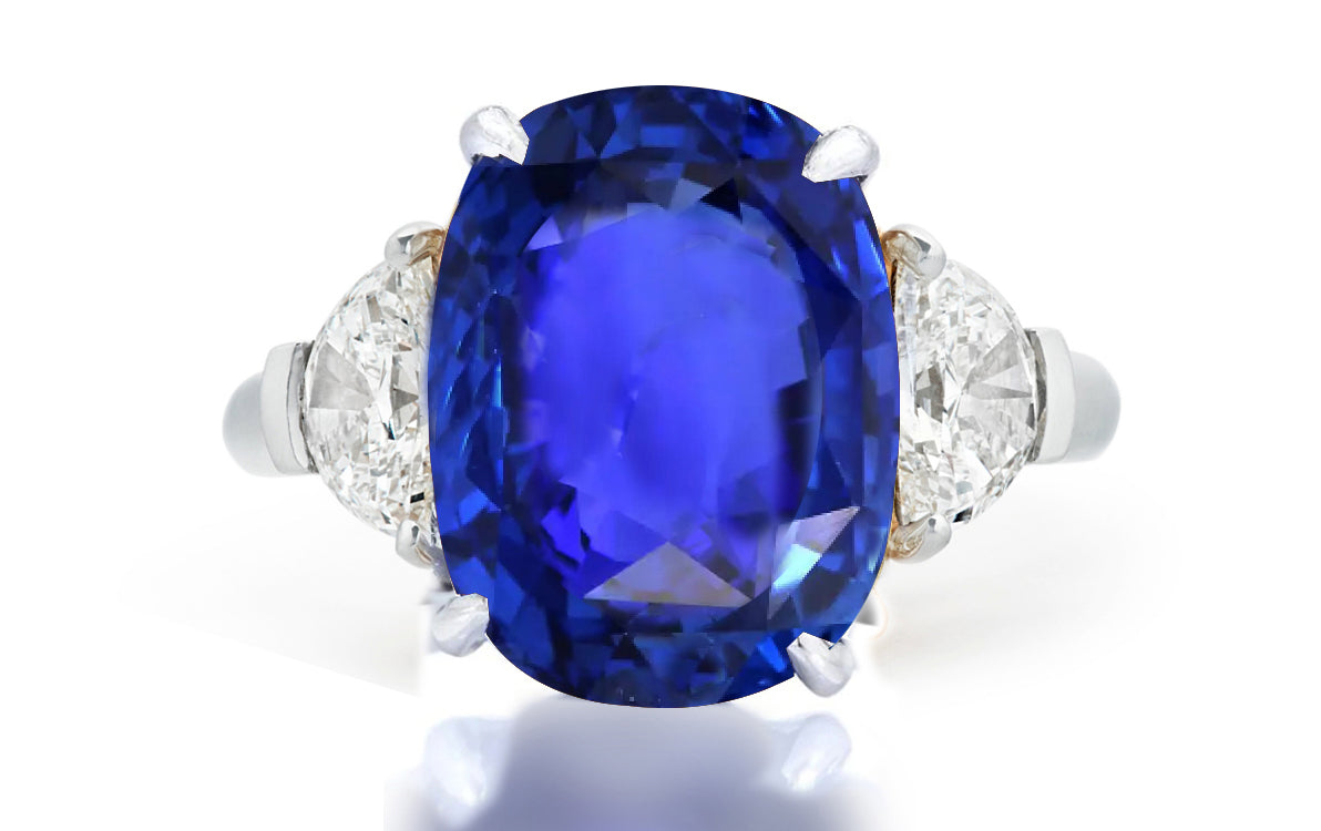 508 custom made unique oval blue sapphire center stone and half moon diamond accent three stone engagement ring