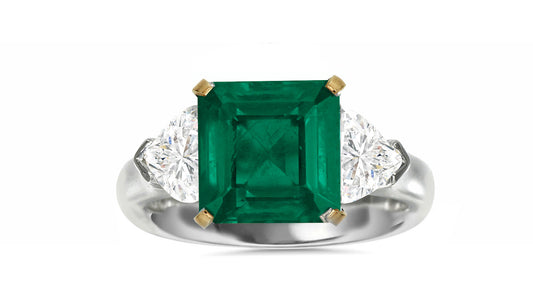 511 custom made unique square emerald center stone and heart diamond accent three stone engagement ring