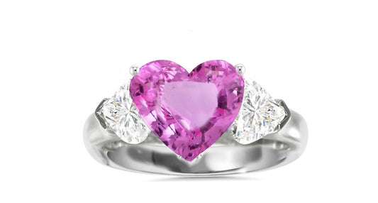 512 custom made unique heart pink sapphire center stone and heart diamond accent three stone engagement ring