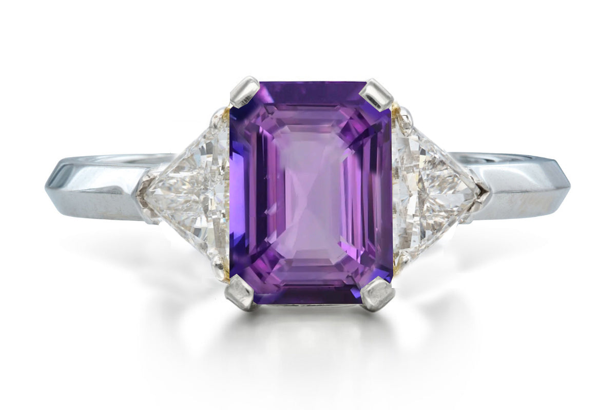 515 custom made unique emerald cut purple sapphire center stone and trillion diamond accent three stone engagement ring