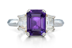 518 custom made unique emerald cut purple sapphire center stone and trapezoid diamond accent three stone engagement ring