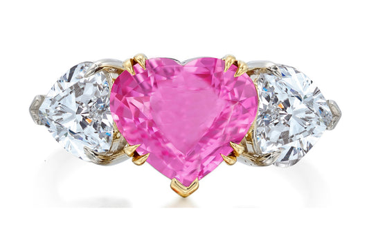 521 custom made unique heart pink sapphire center stone and heart diamond accent three stone engagement ring