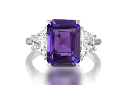 523 custom made unique emerald cut purple sapphire center stone and trapezoid diamond accent three stone engagement ring