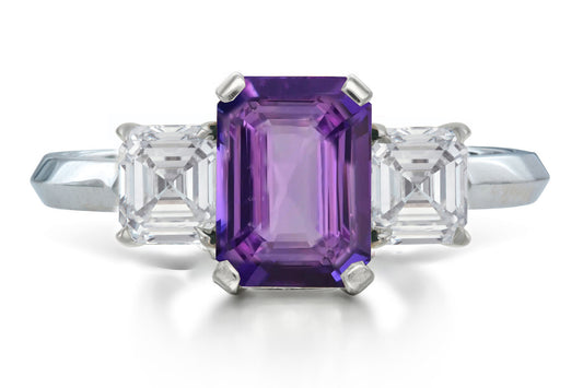 526 custom made unique emerald cut purple sapphire center stone and asccher cut diamond accent three stone engagement ring