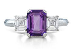 526 custom made unique emerald cut purple sapphire center stone and asccher cut diamond accent three stone engagement ring