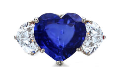 527 custom made unique heart blue sapphire center stone and heart diamond accent three stone engagement ring