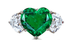 527 custom made unique heart emerald center stone and heart diamond accent three stone engagement ring