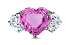 527 custom made unique heart pink sapphire center stone and heart diamond accent three stone engagement ring