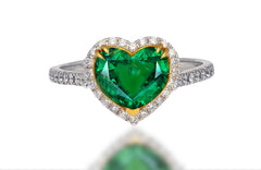 554 custom made unique heart emerald center stone and round diamond halo engagement ring