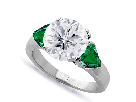 602 custom made unique round diamond center stone and heart emerald three stone engagement ring