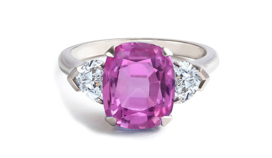 604 custom made unique cushion pink sapphire center stone and heart diamond three stone engagement ring