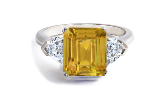 605 custom made unique emerald cut yellow sapphire center stone and heart diamond three stone engagement ring