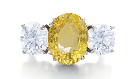 606 custom made unique oval yellow sapphire center stone and round diamond three stone engagement ring