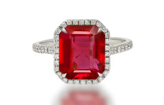 611 custom made unique ruby cut emerald center stone and diamond halo engagement ring