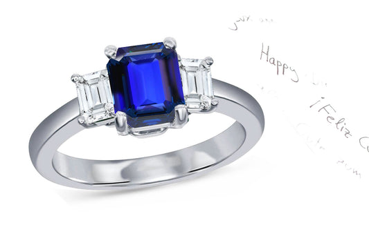 62 custom made unique emerald cut blue sapphire center stone and emerald cut diamond accent three stone engagement