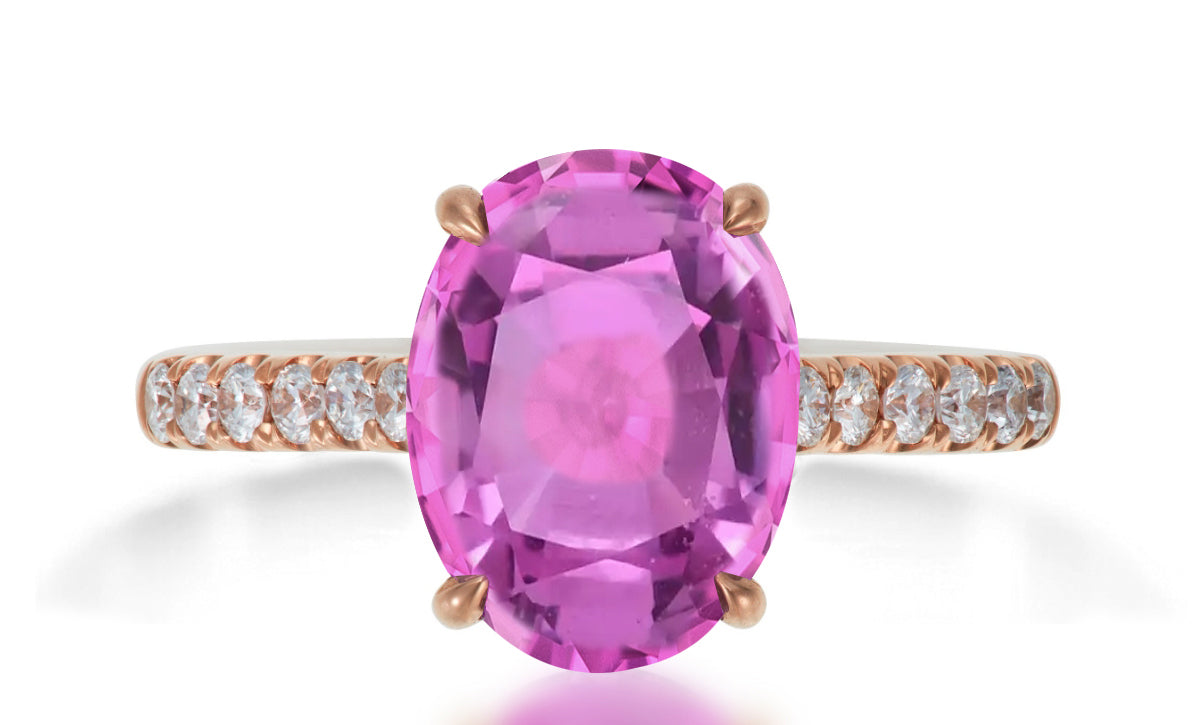 620 custom made unique oval pink sapphire center stone and prong set diamond accent band engagement ring