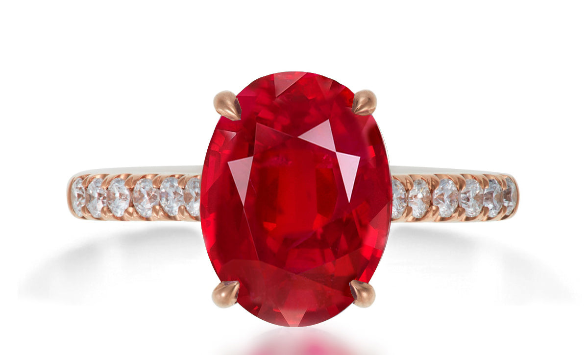 620 custom made unique oval ruby center stone and prong set diamond accent band engagement ring