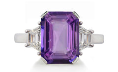 623 custom made unique emerald cut purple sapphire center stone and trapezoid diamond accent three stone engagement ring