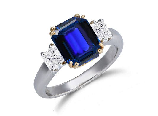 624 custom made unique emerald cut blue sapphire center stone and square diamond accent three stone engagement ring