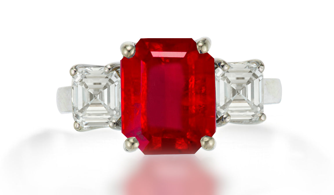 625 custom made unique emerald cut ruby center stone and asscher cut diamond accent three stone engagement ring