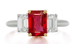 626 custom made unique emerald cut ruby center stone and emerald cut diamond accent three stone engagement ring