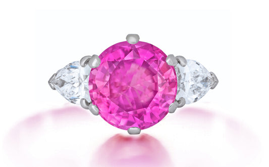 629 custom made unique round pink sapphire center stone and pears diamond accent three stone engagement ring