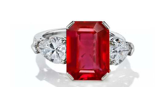 630 custom made unique emerald cut ruby center stone and pears diamond accent three stone engagement ring