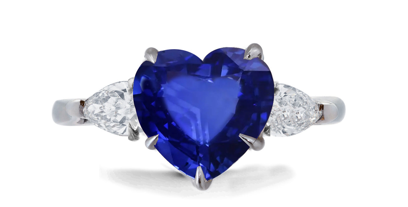 636 custom made unique heart blue sapphire center stone and pears diamond accent three stone engagement ring