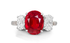 646 custom made unique oval ruby center stone and oval diamond accent three stone engagement ring