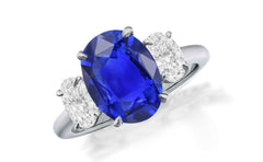 648 custom made unique oval blue sapphire center stone and oval diamond accent three stone engagement ring