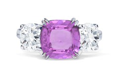 651 custom made unique cushion pink sapphire center stone and round diamond accent three stone engagement ring