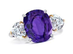 660 custom made unique oval purple sapphire center stone and heart diamond accent three stone engagement ring