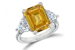 669 custom made unique emerald cut yellow sapphire center stone and heart diamond accent three stone engagement ring