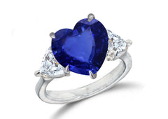 670 custom made unique heart blue sapphire center stone and heart diamond accent three stone engagement ring