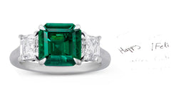 68 custom made unique asscher cut emerald center stone and asscher cut diamond accent three stone engagement ring