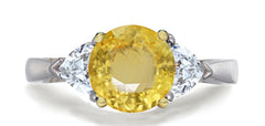 680 custom made unique round yellow sapphire center stone and heart diamond accent three stone engagement ring