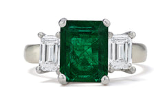 682 custom made unique emerald cut emerald center stone and emerald cut diamond accent three stone engagement ring