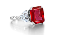 688 custom made unique emerald cut ruby enter stone and heart diamond accent three stone engagement ring