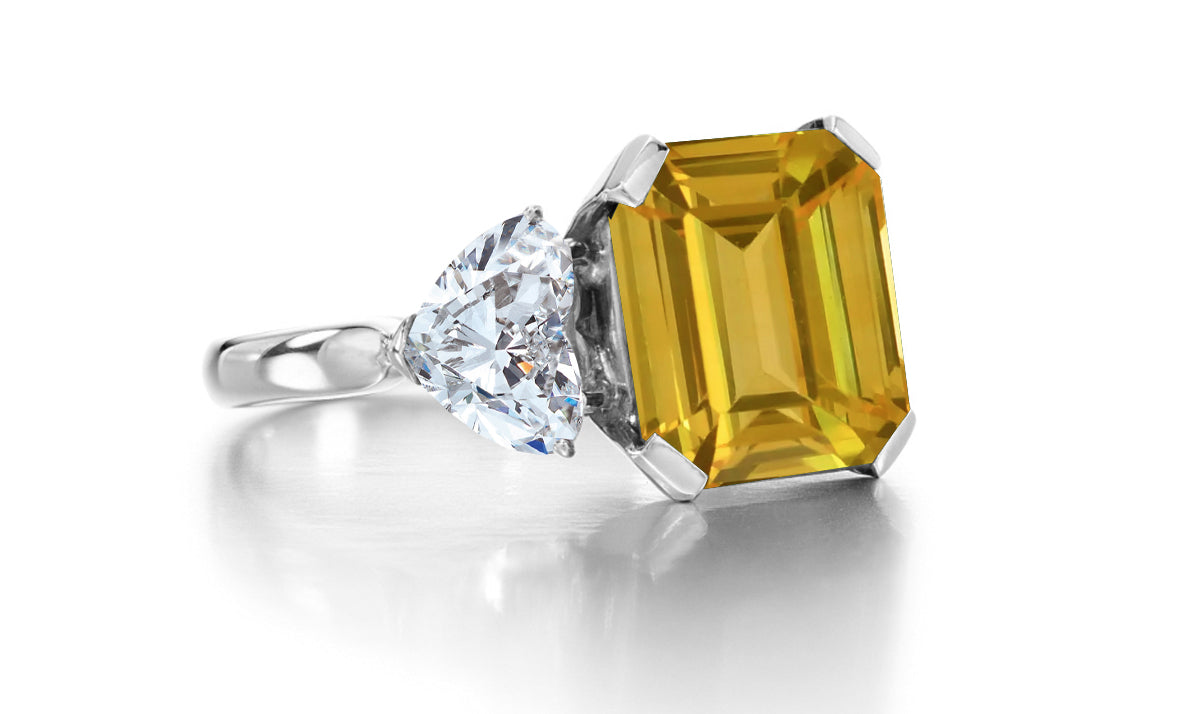 688 custom made unique emerald cut yellow sapphire center stone and heart diamond accent three stone engagement ring