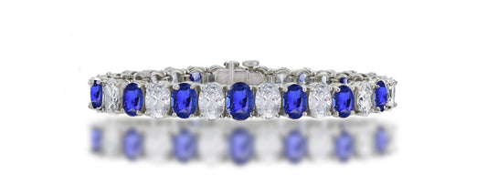 7 custom unique alternating oval blue sapphire and diamond tennis bracelet