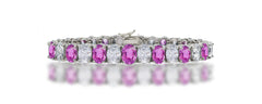 7 custom unique alternating oval pink sapphire and diamond tennis bracelet