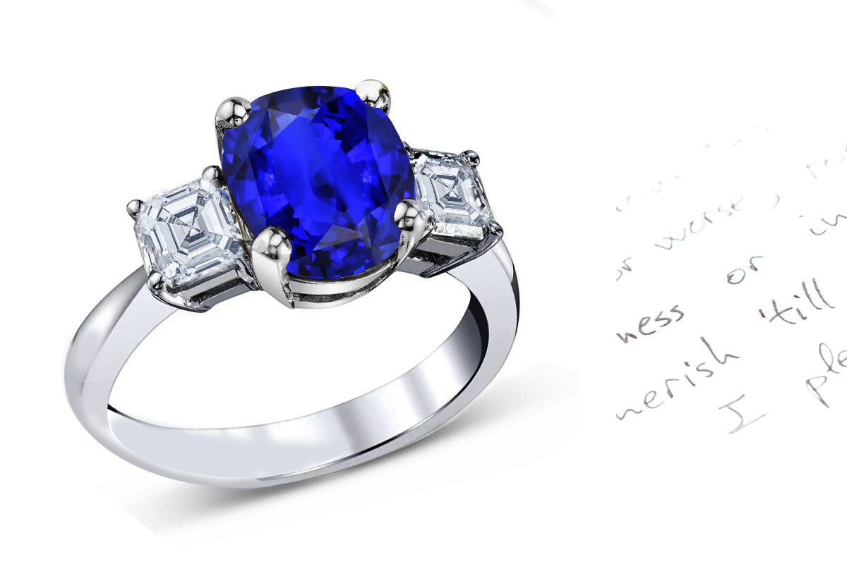 74 custom made unique oval cut blue sapphire center stone and asscher cut diamond accent three stone engagement ring