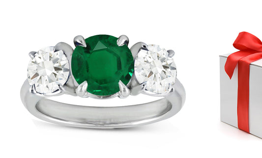 76 custom made unique round emerald and diamond three stone engagement ring