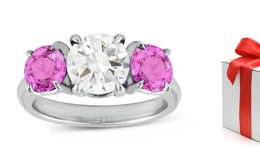 77 custom made unique round pink sapphire and diamond three stone engagement ring